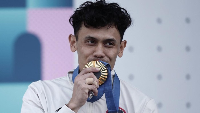 ekspresi veddriq usai sumbang emas olimpiade pertama untuk indonesia 3 169 1